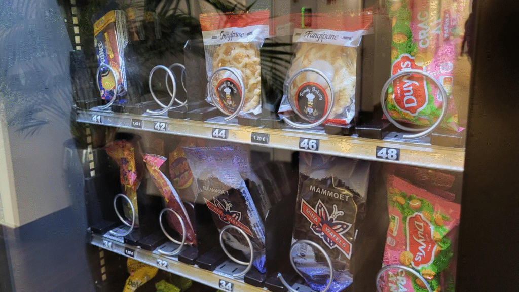 Candy and snack machine with different products visible.